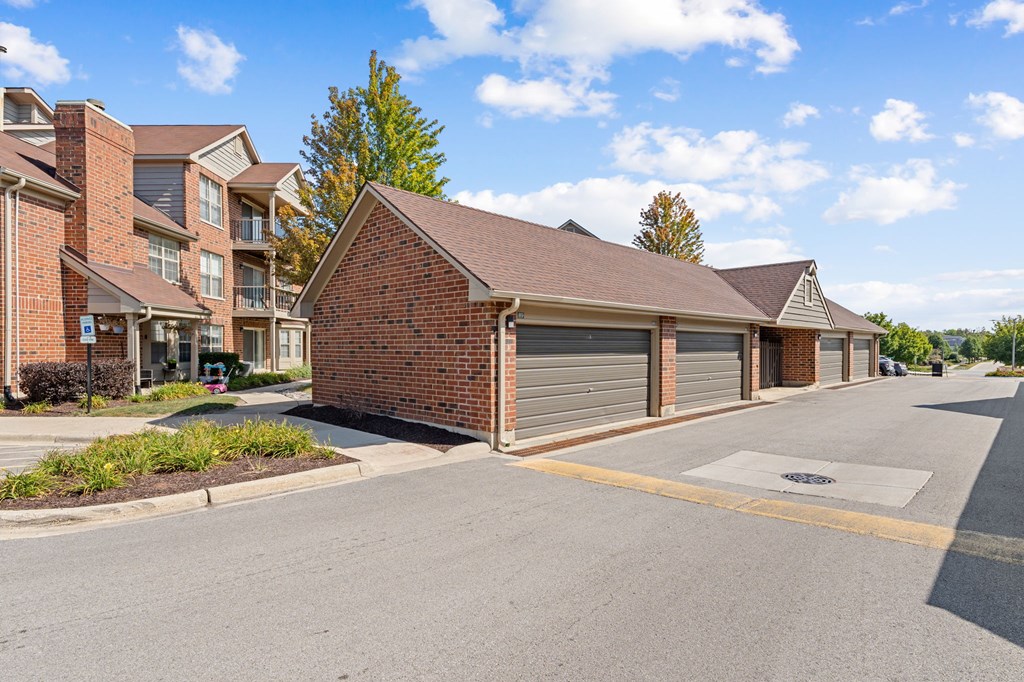 A row of houses with a clear blue sky above them.