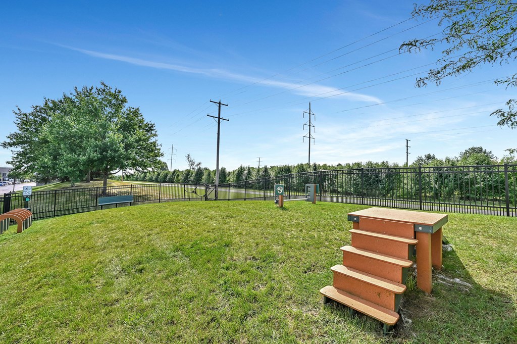fenced-in dog park on the Farmington Lakes property in Oswego