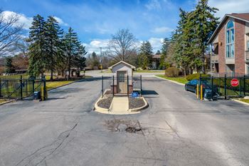 gated entrance to The Addison at Southfield apartments in Southfield, MI