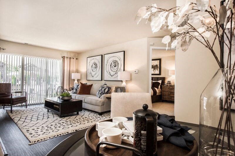 a living room with a couch and a table