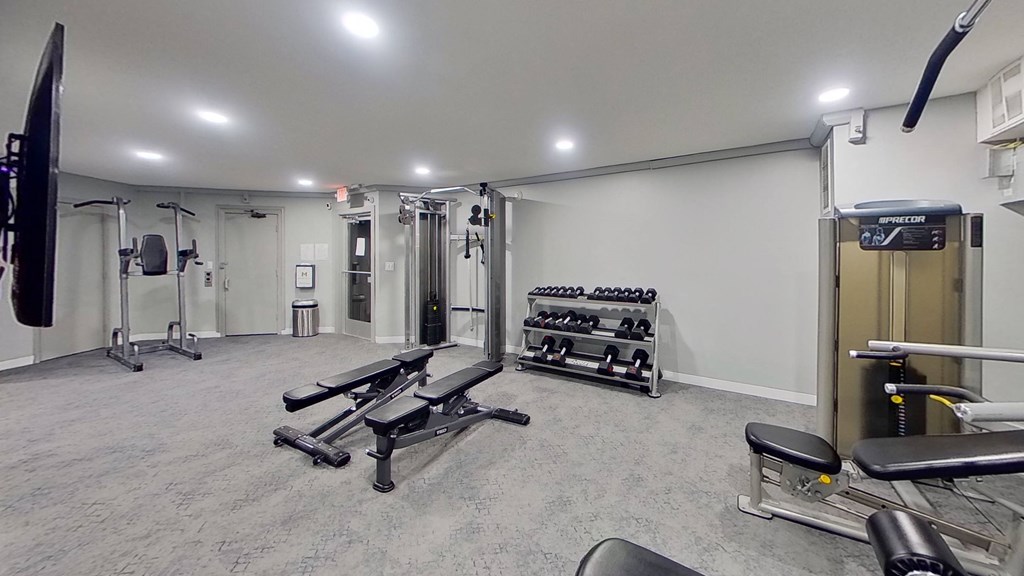 the gym at the flats at big tex apartments