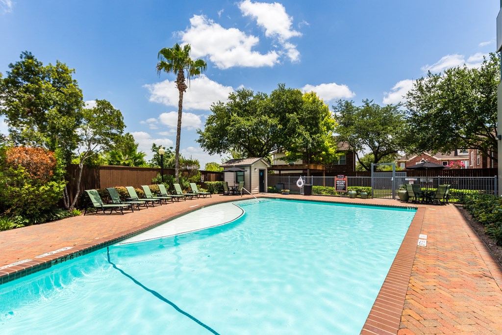 our apartments have a resort style pool with lounge chairs