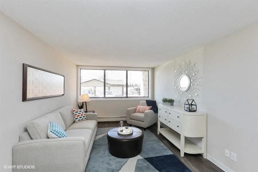 a living room with a couch and a table