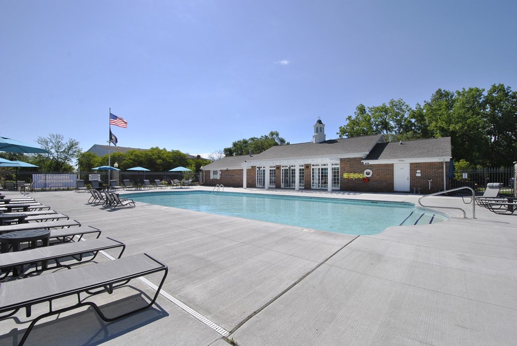 The Maxwell's swimming pool and expansive sun deck with lounge seating