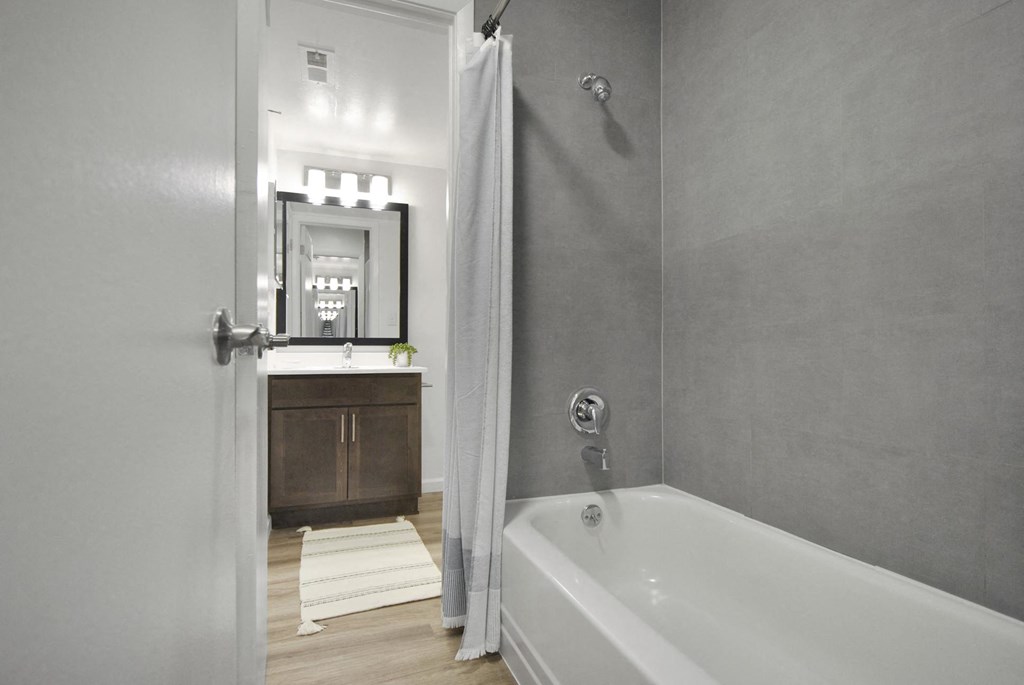 tub in a bathroom of a Romulus apartment