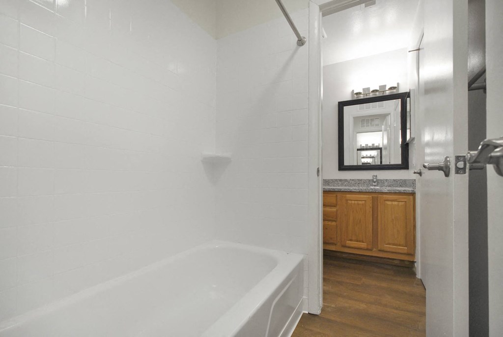 bathroom with a white tub