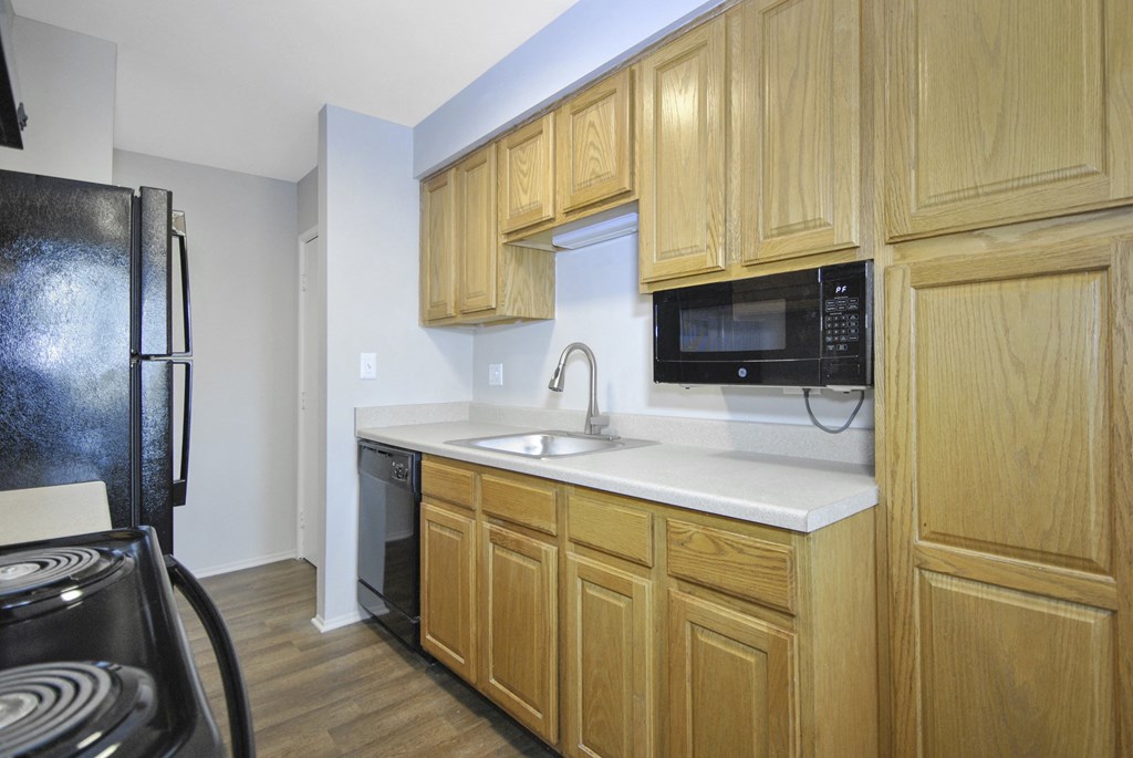 light cabinetry in an apartment kitchen