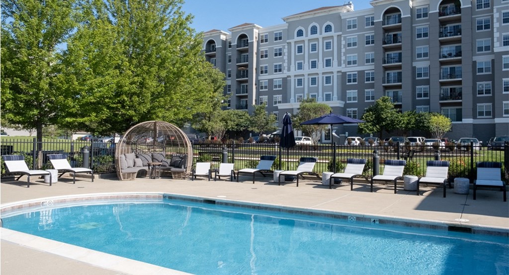 Exterior clubhouse and pool - The Mil'Ton Luxury Apartments