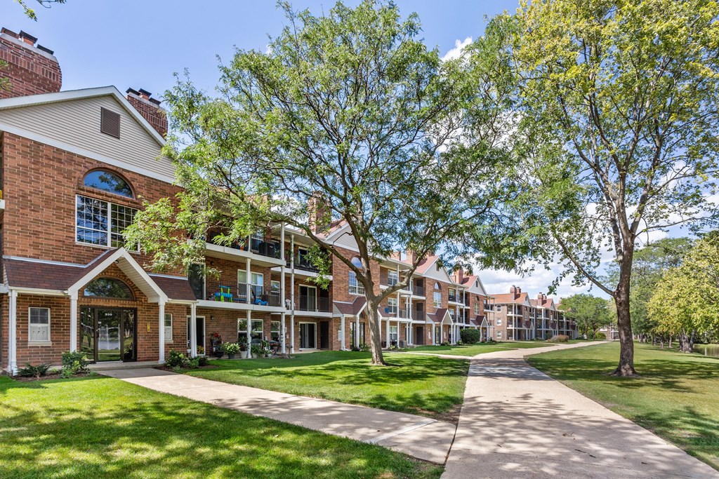 A long building with a lot of windows and balconies.