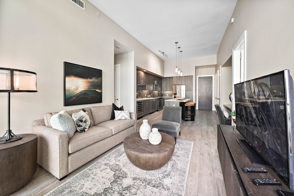 a living room with a couch and a table