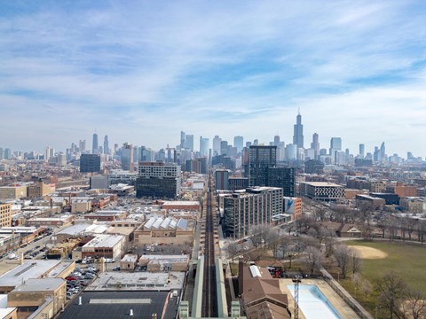 a view of the skyline from the top of a skyscraper