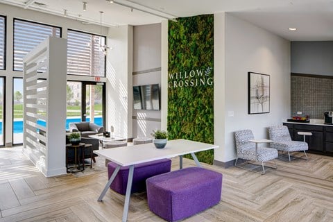 Willow Crossing apartment community lobby with a white desk
