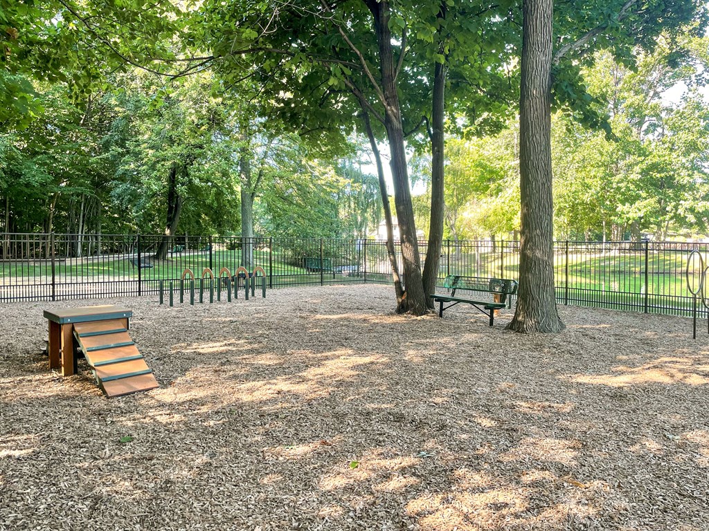 fenced-in, mulched dog park at Fairlane Woods