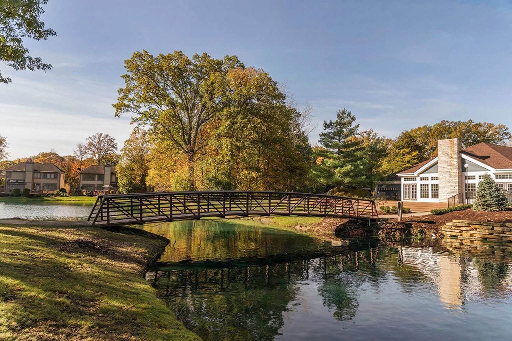 pond with a bridge on the Fairlane Woods property in Dearborn, MI