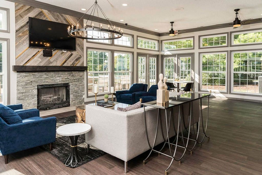 seating area with floor-to-ceiling windows in the Fairlane Woods resident clubhouse