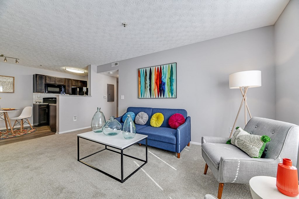 a living room with a couch and a table