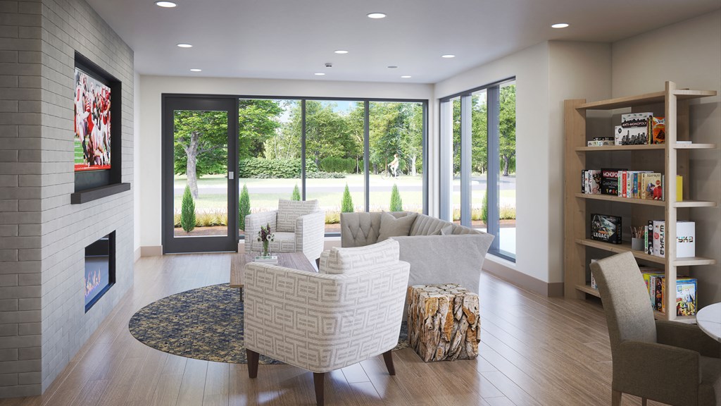 a community space with a fireplace and large windows