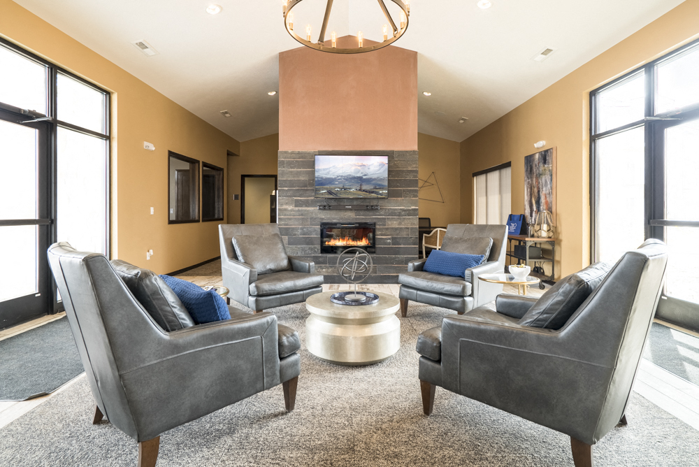 Clubhouse lounge with seating at 360 at Jordan West best new apartments West Des Moines IA 50266