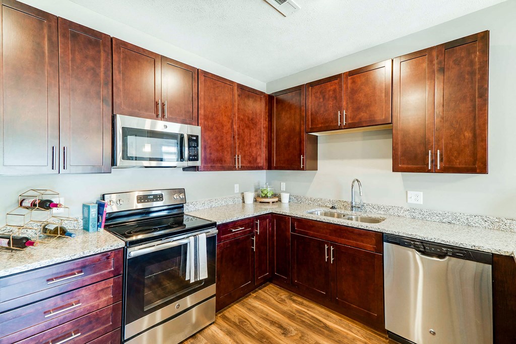 Spacious kitchen with granite countertops of 2 bedroom apartment for rent at 360 at Jordan West best new apartments West Des Moines IA 50266