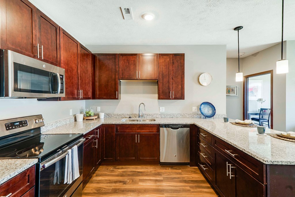 Spacious kitchen with granite countertops of 2 bedroom apartment for rent at 360 at Jordan West best new apartments West Des Moines IA 50266