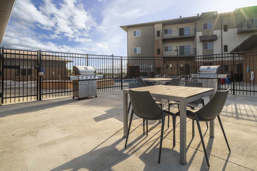 Outdoor seating and grill at 360 at Jordan West best new apartments West Des Moines IA 50266