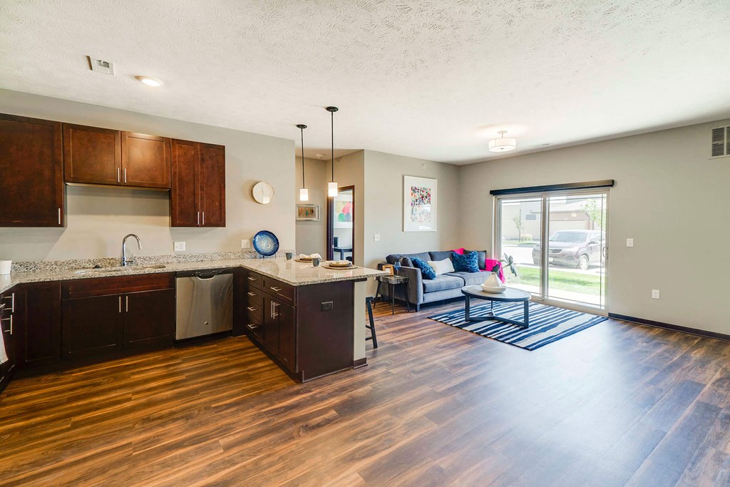 Spacious living room and kitchen of 2 bedroom apartment for rent at 360 at Jordan West best new apartments West Des Moines IA 50266