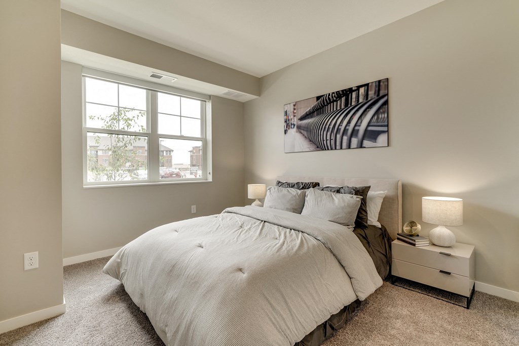 Bedroom with walk-in closet at Ascend at Woodbury in Woodbury MN
