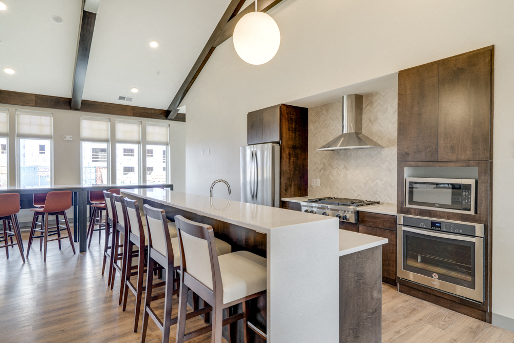Clubhouse kitchen for resident use at Ascend at Woodbury new luxury apartments in Woodbury MN 55129