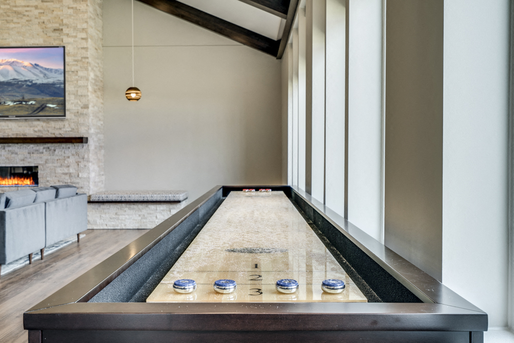 Shuffleboard table in the clubhouse at Ascend at Woodbury apartments in MN