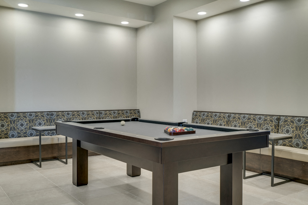 Pool table in the clubhouse's party room at Ascend at Woodbury new luxury apartments in Woodbury MN 55129