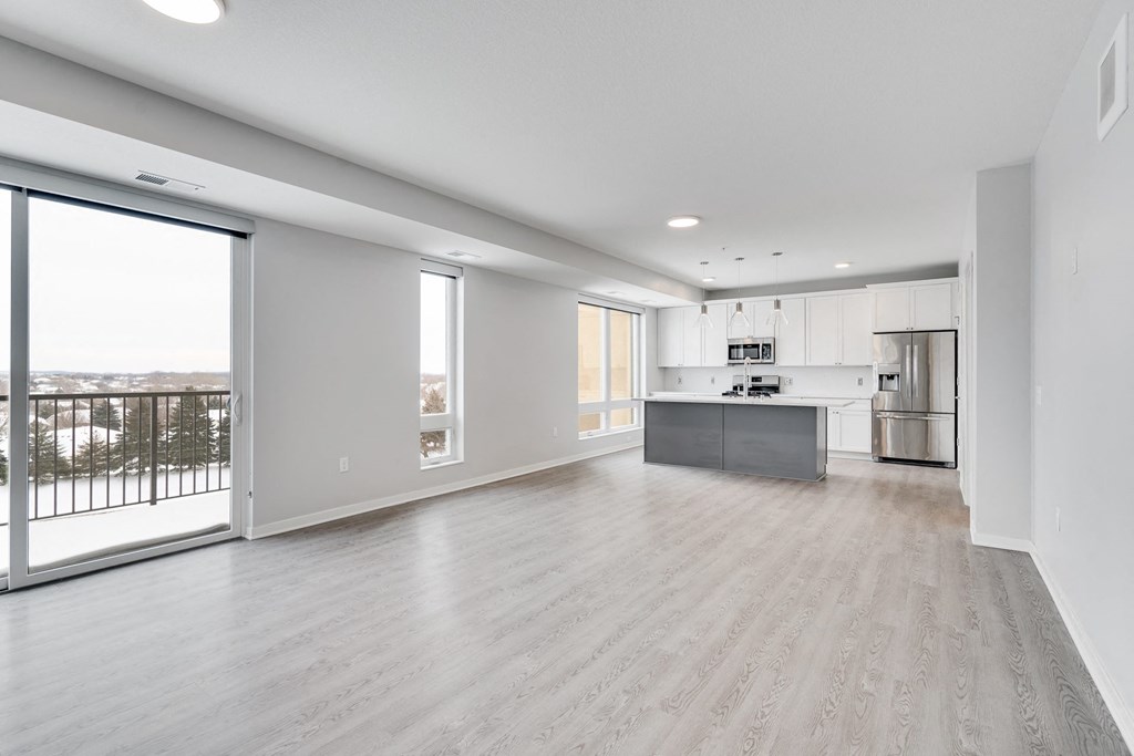 Open living and dining area with lots of natural light at Aspire at CityPlace in Woodbury, Minnesota