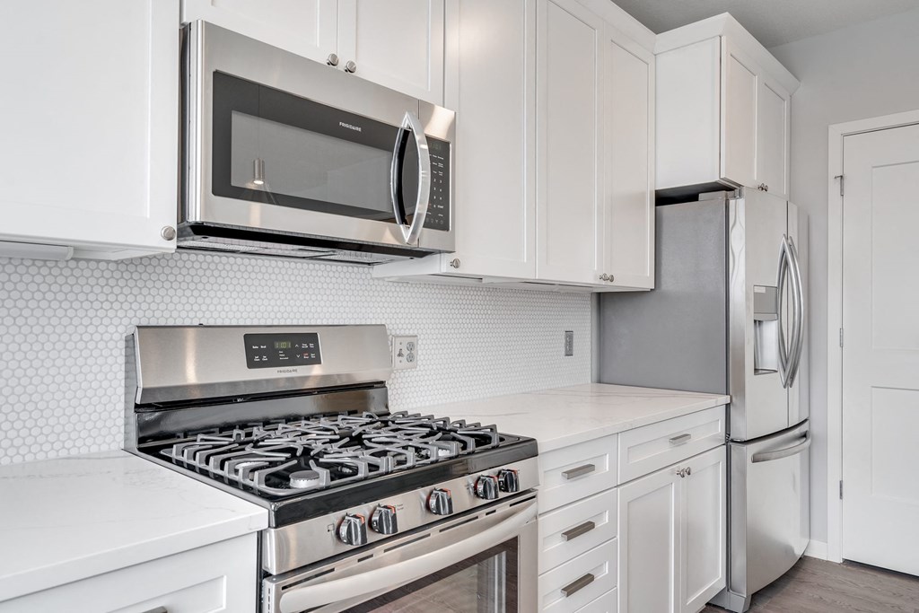 Matching stainless steel appliances in the kitchen of a luxury apartment home at Aspire at CityPlace in Woodbury, Minnesota