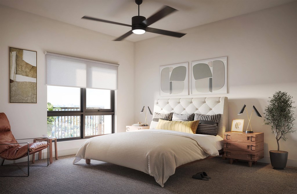 a bedroom with a bed and a ceiling fan in apartment at Brynwood at Wilderness Ridge