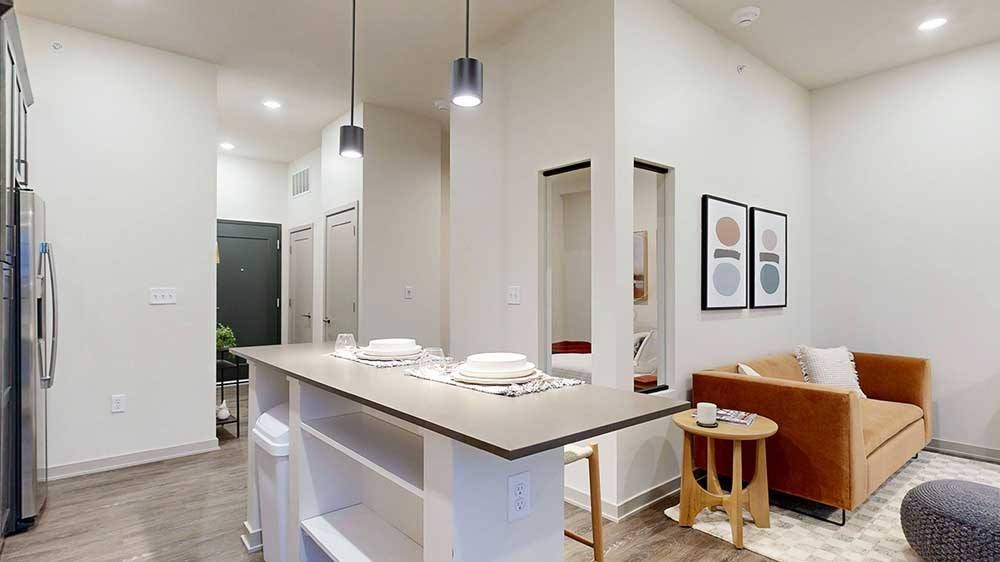 a compact kitchen island with built in storage