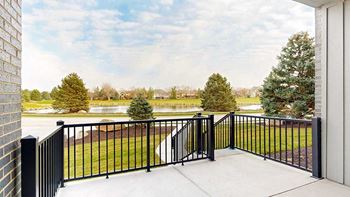 the view from the walk-out patio of the pond to the east