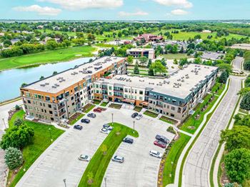 A luxury apartment building with a private courtyard next to the Wilderness Ridge golf course in the Wilderness Ridge neighborhood in Lincoln, NE.