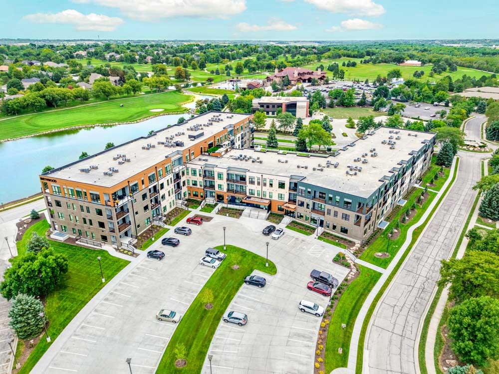 A luxury apartment building with a private courtyard next to the Wilderness Ridge golf course in the Wilderness Ridge neighborhood in Lincoln, NE.