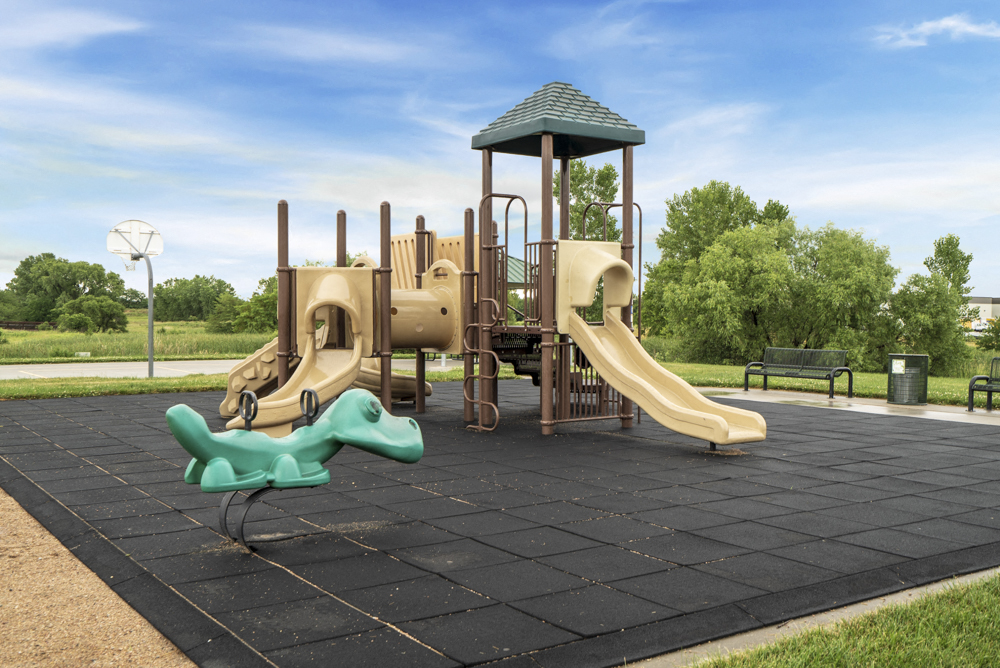Playground at Schleich Park near Cascade Pines Duplex and Townhomes