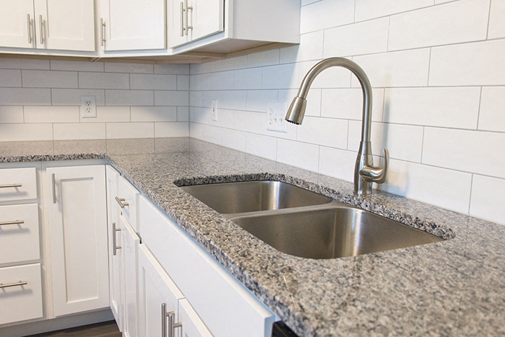 Stainless-steel sink in kitchen at Cascade Pines Town-homes Lincoln Nebraska