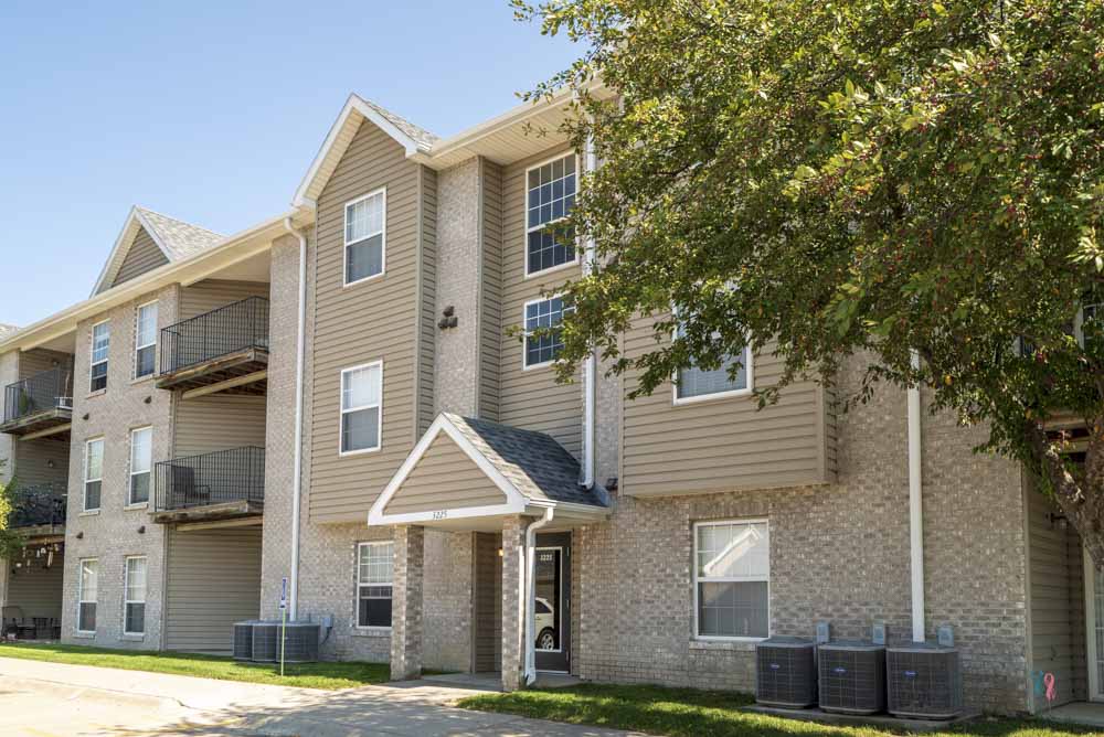 Buildings include controlled-access entries and balconies at Eagle Run Apartments in northwest Omaha 68164
