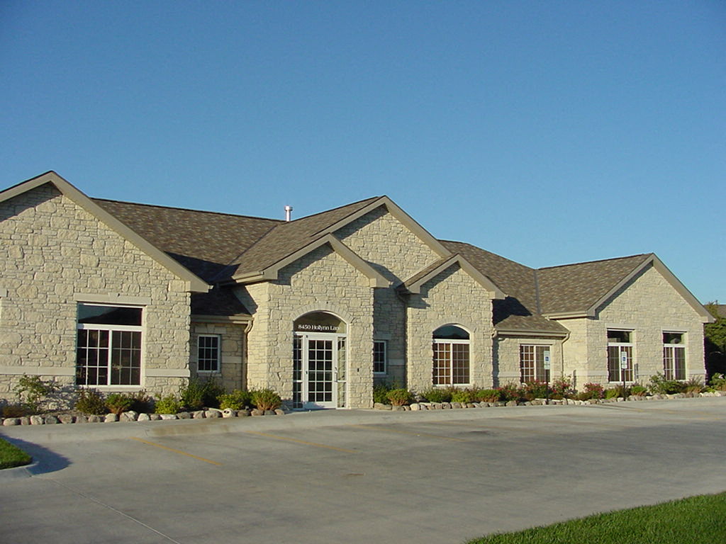 Clubhouse exterior landscaping at Stone Ridge Estates Apartments in Lincoln Nebraska