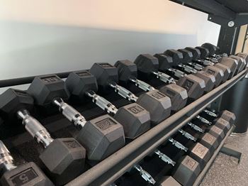 Dumbbell free weights in the fitness center at Haven at Uptown in Lincoln, NE