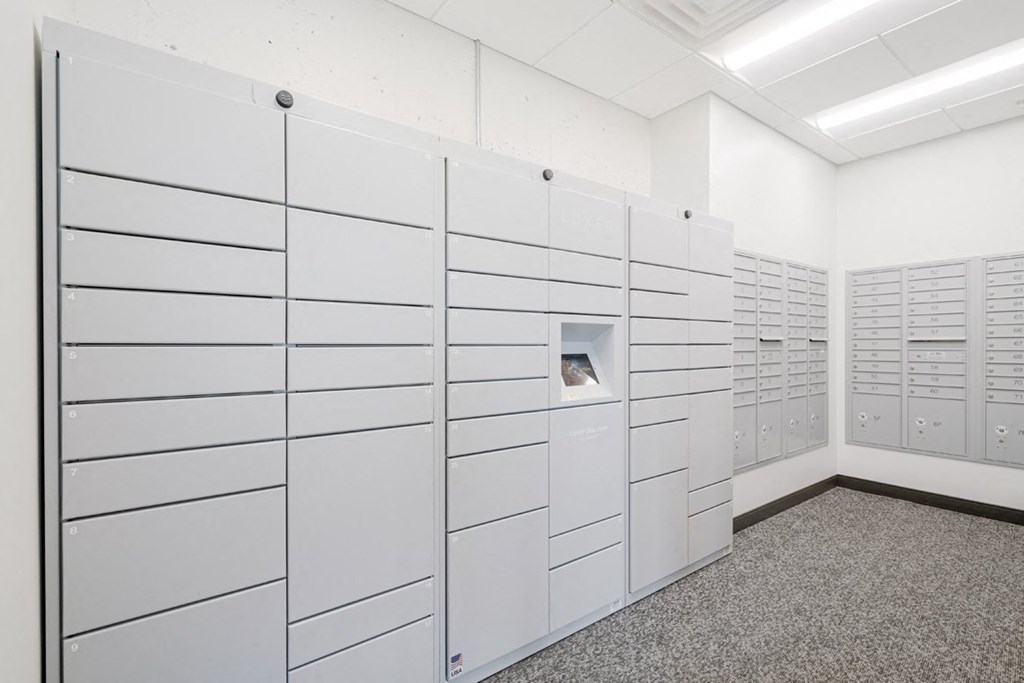 a row of white lockers in a white room