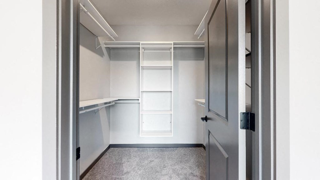 Large walk in closet that provides plenty of extra storage space for all of your belongings at Haven at Uptown in Lincoln, NE