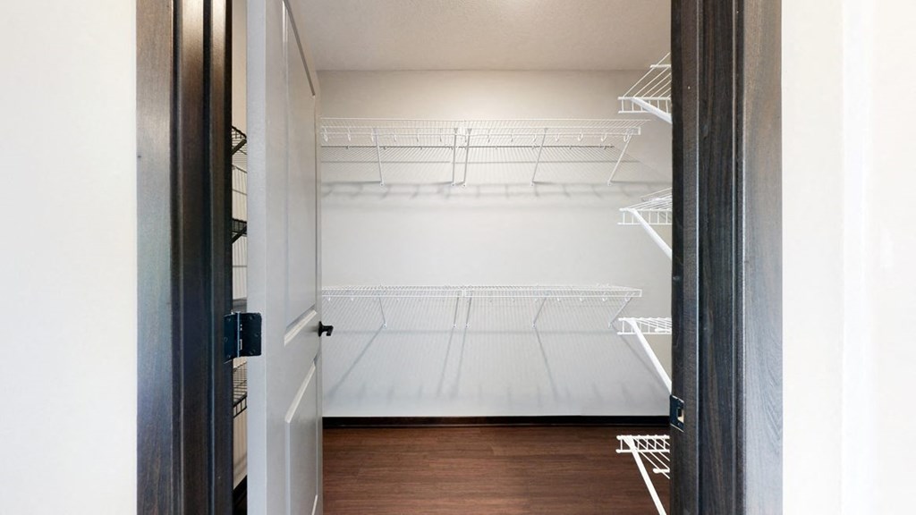 Master bedroom attached walk in closet provides plenty of extra storage space at Haven at Uptown in Lincoln, NE