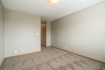 Empty bedroom with carpet and open space at Highland View - Photo Gallery 50