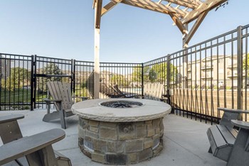 Outdoor fire pit at Highland View Apartments in north Lincoln NE 68521 - Photo Gallery 32