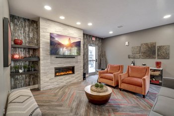 Clubhouse TV lounge at Highland View Apartments in north Lincoln NE 68521 - Photo Gallery 21