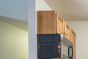 Interiors Kitchen with hardwood-style flooring and subway tile backsplash at Williamsburg Park Apartments in Lincoln NE Kitchen with hardwood-style flooring and subway tile backsplash at Williamsburg Park Apartments in Lincoln NE - Photo Gallery