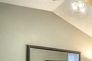 Interiors Fountain Glen Apartment With several large bedrooms in Lincoln Nebraska Living room with large sliding doors at Fountain Glen Apartments